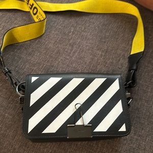 Off white bag with yellow strip